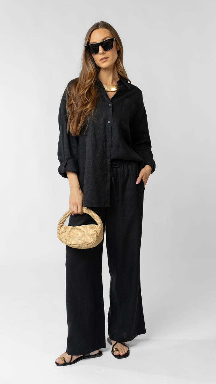 model wearing linen top and pants in black