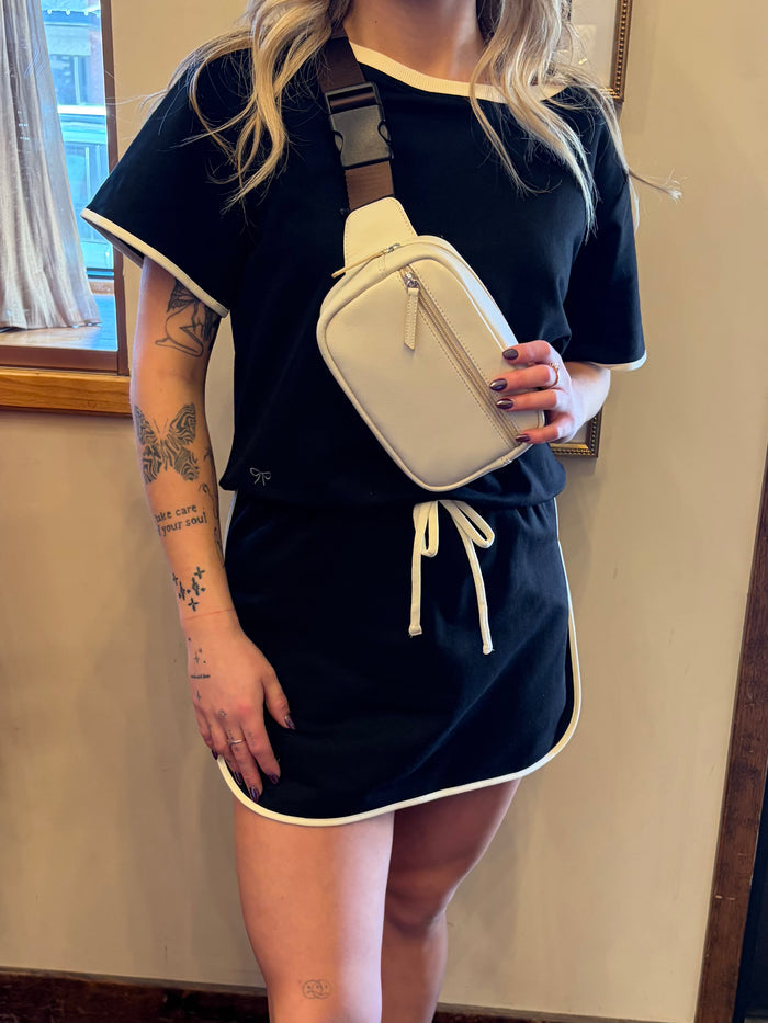 Black and cream Simply Southern skort with built-in shorts and a stylish, casual design, perfect for warm weather outings.