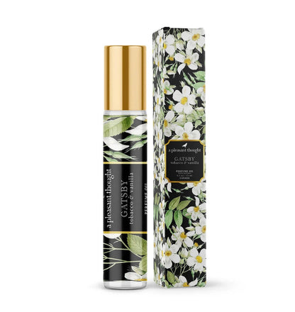 A Pleasant Thought Gatsby perfume oil bottle with tobacco and vanilla scent, featuring elegant packaging and a luxurious design.