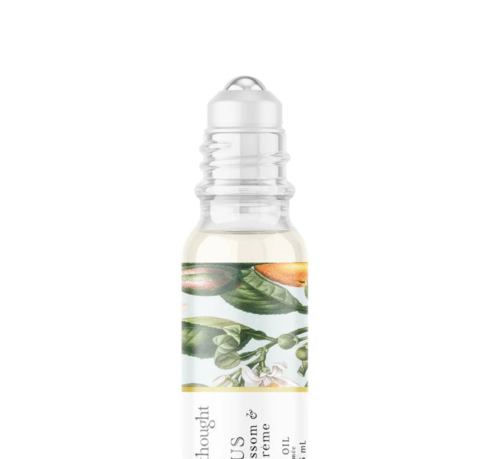 A Pleasant Thought Venus perfume oil with orange blossom and vanilla crème, featuring a sleek glass bottle and elegant packaging.