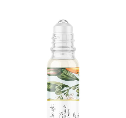 A Pleasant Thought Venus perfume oil with orange blossom and vanilla crème, featuring a sleek glass bottle and elegant packaging.