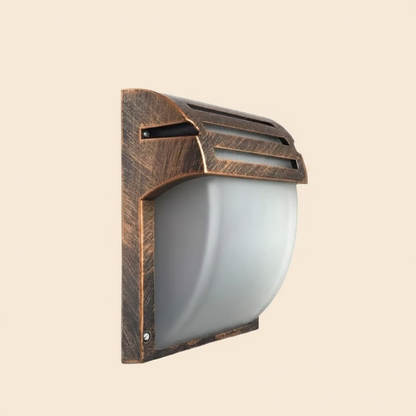 Antique bronze outdoor wall light - cream background