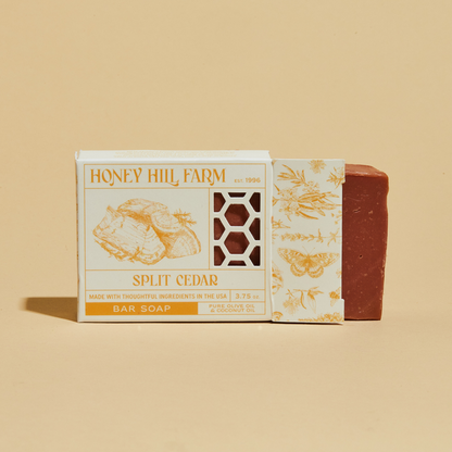 Honey Hill Farm Split Cedar bar soap with warm orange-brown bar and gold label box.