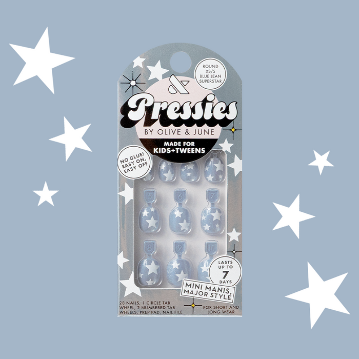 Blue Jean Superstar - Pressies | Extra Short Short | Round showing shimmery blue press on nails with white stars in packaging on starry background