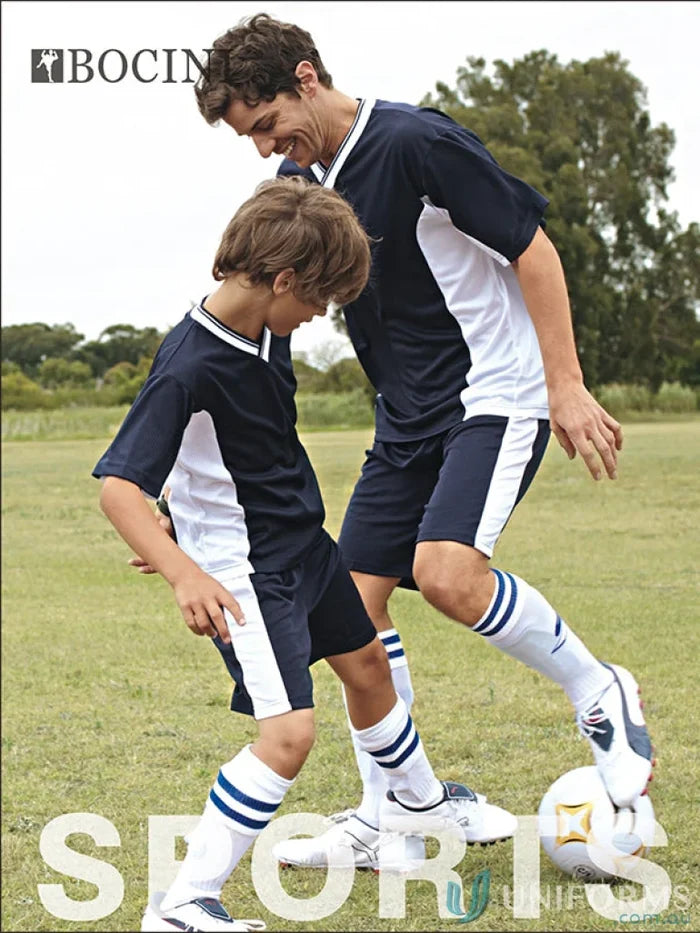Two people in matching navy and white sports socks with uniforms, perfect for shoe size selection