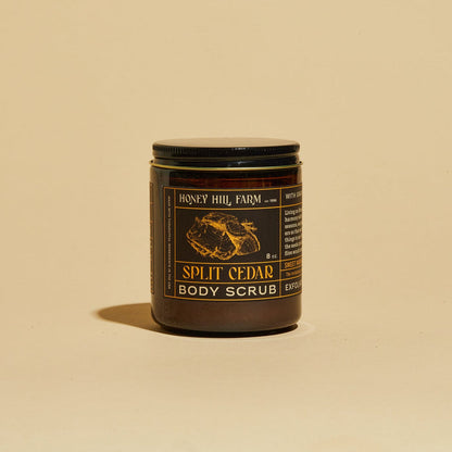 Split Cedar body scrub jar with black lid and honeycomb label