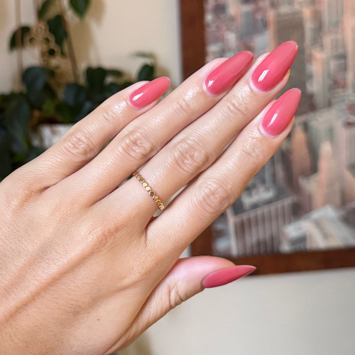 Boysenberry Glass - Gel on almond-shaped nails in a sheer berry jelly shade for a glossy long-lasting manicure