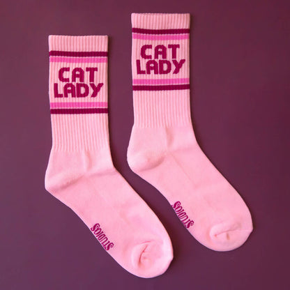 Sunshine Studios Cat Lady striped ribbed crew socks featuring colorful feline patterns and comfortable ribbed design.