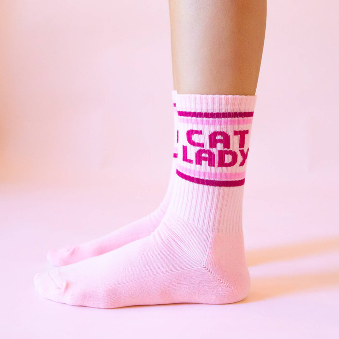 Sunshine Studios cat lady striped ribbed crew socks featuring colorful, cozy knit pattern and comfortable fit.