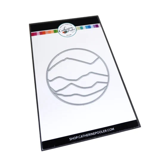 Catherine Pooler - Die - Circle Landscape. Take your scene building up a level with the Circle Landscape Die by adding a backdrop of mountains or water. Or just to add some fun pops of colour. Available at Embellish Away located in Bowmanville Ontario Canada.