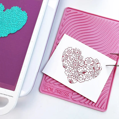 Catherine Pooler - Hot Foil Plate - Hearts Aflutter. Foil a beautiful statement piece with the Hearts Aflutter Foil Plate. This floral heart features a butterfly and is a large image to fill your card front. Available at Embellish Away located in Bowmanville Ontario Canada. Example by brand ambassador.