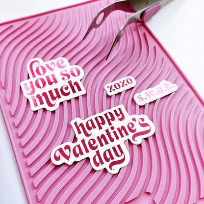 Catherine Pooler - Hot Foil Plates and Dies - Sweet Nothings. Add a foiled sentiment to your next Valentine project with the Sweet Nothings Hot Foil Plates. Featuring a large "love you so much" and "happy Valentine's day" , a small "s.w.a.k" and "xoxo". Available at Embellish Away located in Bowmanville Ontario Canada. Example by brand ambassador.