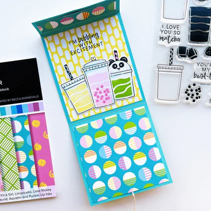 Catherine Pooler - Patterned Paper - Bubbleberry. Bubbleberry Patterned Paper is a joyous mix featuring a party combo of It's a Girl, Limoncello, Lime Rickey, Cummerbund, Aquatini and Pucker Up. Available at Embellish Away located in Bowmanville Ontario Canada. Example by brand ambassador.