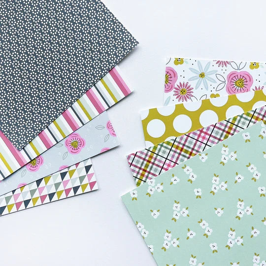 Catherine Pooler - Patterned Paper - Favorite Prints. Add the perfect floral print or versatile pattern with the Favorite Prints Patterned Paper. Featuring Pink Champagne, With an Olive, Wintergreen, Seafoam, Sparkling Berry, Pebble and Black Jack Inks. Available at Embellish Away located in Bowmanville Ontario Canada.