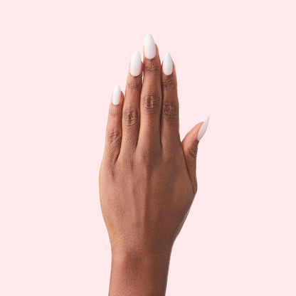 CCT Gradient - Press-On | Medium | Almond showing hand with medium almond-shaped false nails in soft white to sheer pink ombré manicure