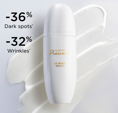 Clarins Precious Le Sérum brightening serum in 30ml bottle, new in box, showcasing elegant packaging and product labeling