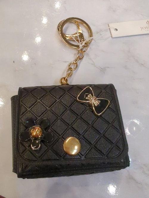 Josslyn designer bag charm keychain with colorful decorative elements hanging from a silver clip.