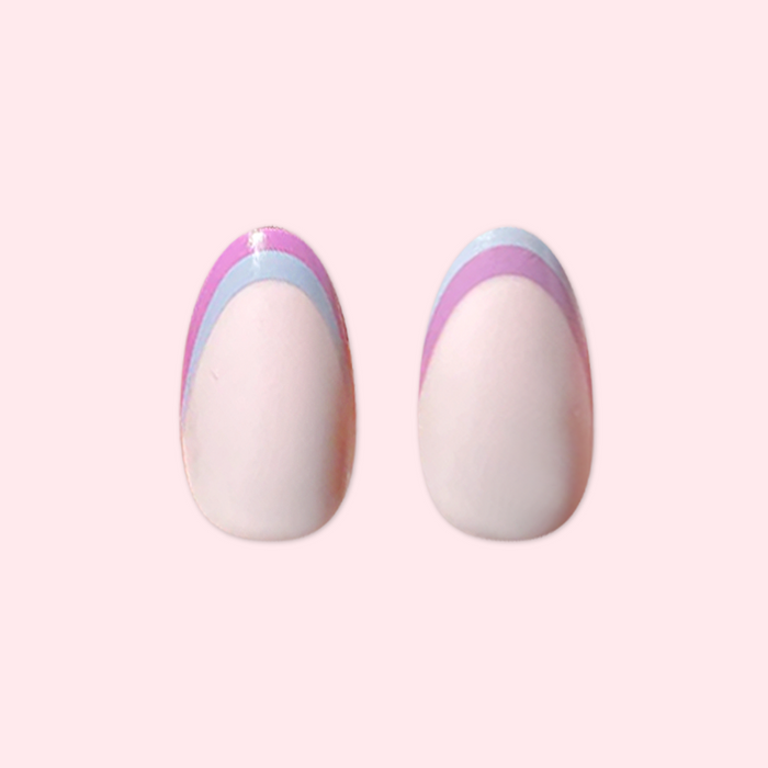 Double French - Press-On | Medium | Oval showing medium oval false nails with two-tone pastel french tip manicure design