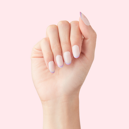 Double French - Press-On | Medium | Oval showing medium oval false nails with dual pastel french tip manicure design on hand