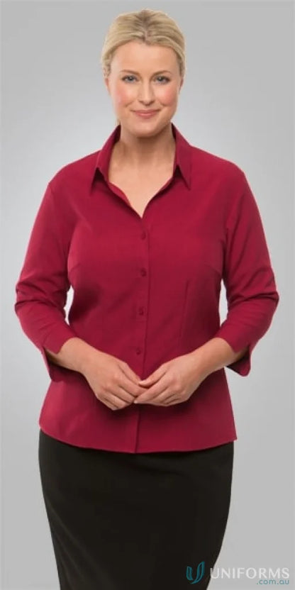 Woman in Ezylin Ladies 3qtr Shirt with shaped hem and open neckline for work uniforms