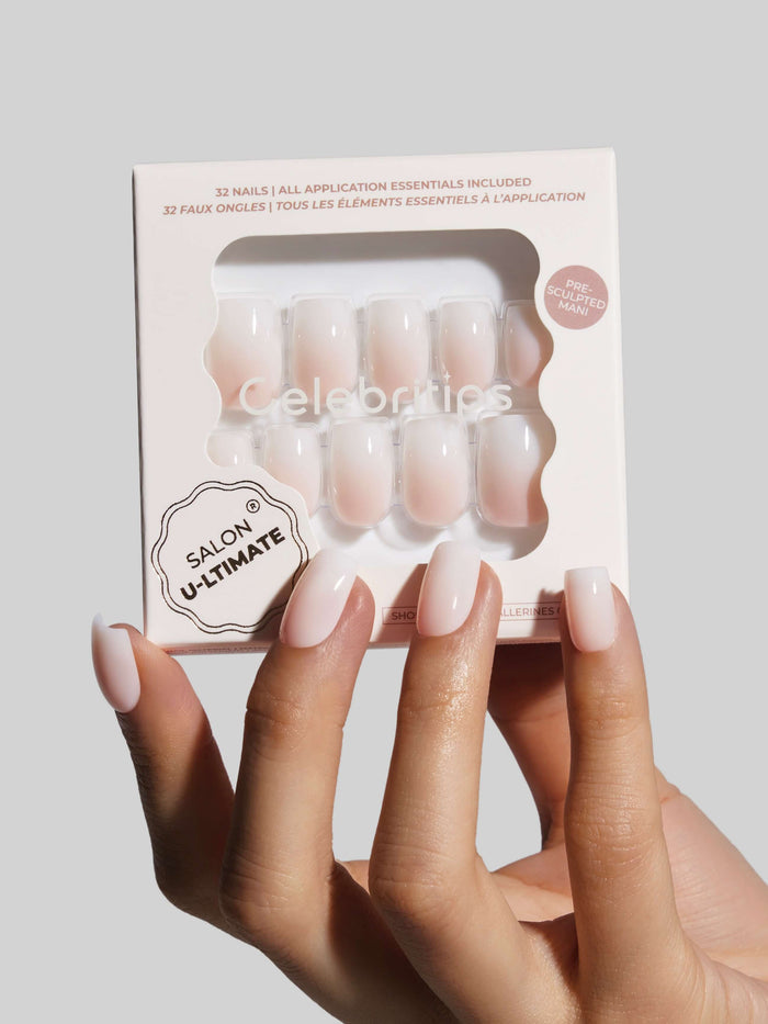 Nail art kit with Celebritips branding held by a hand against a light gray background