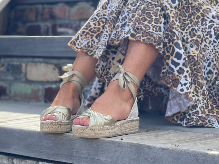 Comfortable, Spanish leather espadrille sandals with enclosed toe. Lace up pattern is gold colour. Quality European women's footwear and shoes.