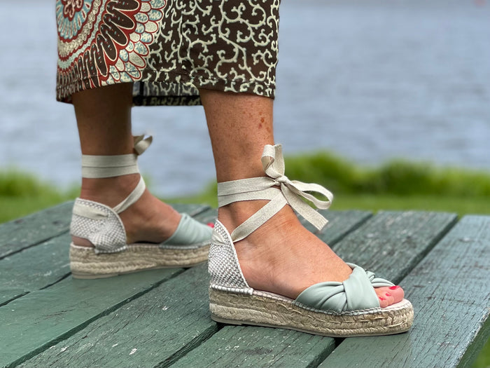 Comfortable, Spanish leather espadrille sandals with enclosed toe. Lace up pattern is sage green colour. Quality European women's footwear and shoes.
