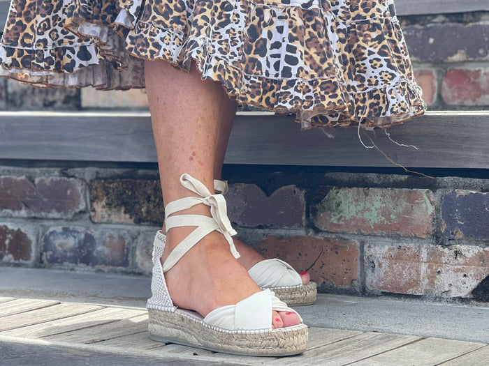 Comfortable, Spanish leather espadrille sandals with enclosed toe. Lace up pattern is cream colour. Quality European women's footwear and shoes.