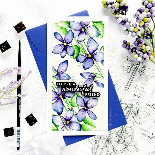 Gina K. Designs - Stamp & Die Set - Blue Violets. Blue Violet is a stamp set by Arjita Singh. This set is made of premium clear photopolymer and measures 6" X 8". The die set gives you the ability to cut out and layer, creating texture to your creation. Available at Embellish Away located in Bowmanville Ontario Canada. Example by brand ambassador.