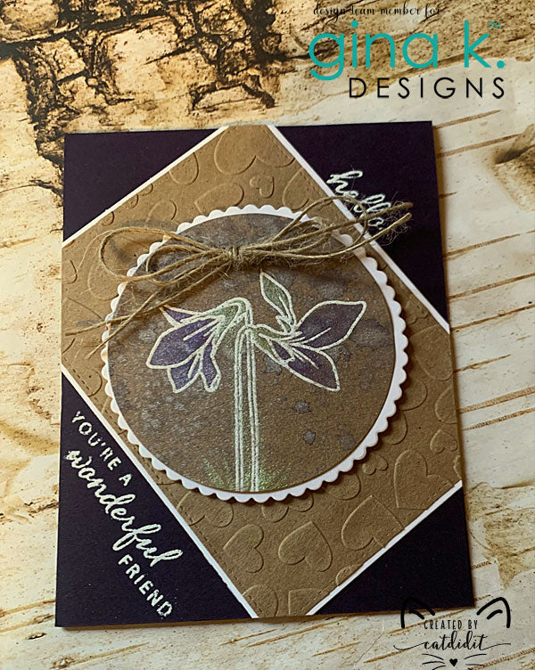 Gina K. Designs - Stamp & Die Set - Blue Violets. Blue Violet is a stamp set by Arjita Singh. This set is made of premium clear photopolymer and measures 6" X 8". The die set gives you the ability to cut out and layer, creating texture to your creation. Available at Embellish Away located in Bowmanville Ontario Canada. Example by brand ambassador.