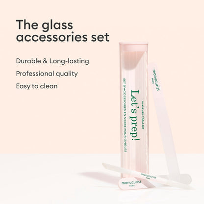 A pink and clear Manucurist-us case labeled "Lets prep!" stands upright beside a glass nail file and cuticle pusher. Text: Glass nail accessory trio—durable, long-lasting, professional quality, easy to clean.