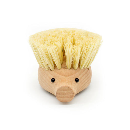 Hedgehog-shaped dish scrubber with light wood body and beige bristle head