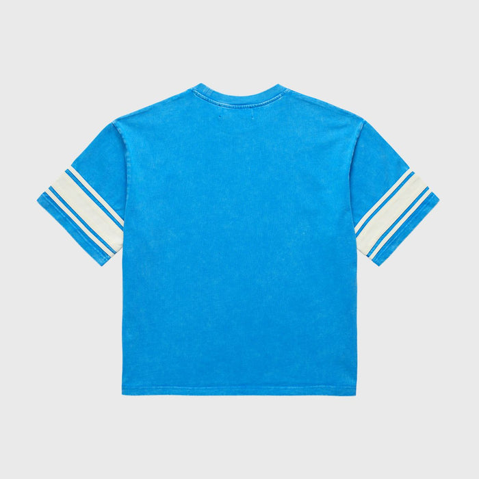 Stone-washed Homme + Femme Kansas cropped blue tee featuring vintage jersey vibe with heavyweight cotton and spring 2025 graphic collection design