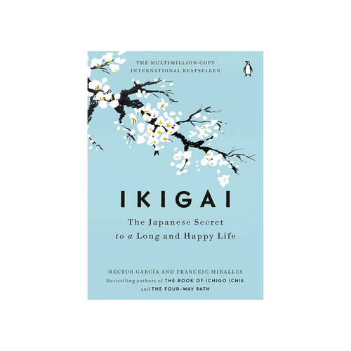 Ikigai book cover with illustrated cherry blossoms and text 'The Japanese Secret'.