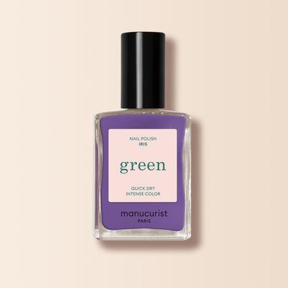 Manucurist Iris is a purple nail polish with blue undertones from the Green™ range, featuring quick-dry intense color, a black cap, and a beige label.