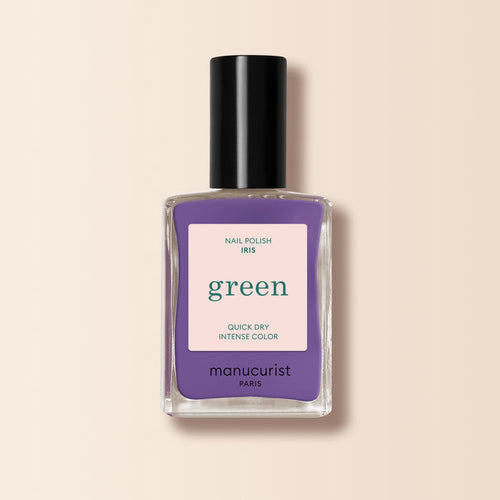 Manucurist Iris is a purple nail polish with blue undertones from the Green™ range, featuring quick-dry intense color, a black cap, and a beige label.