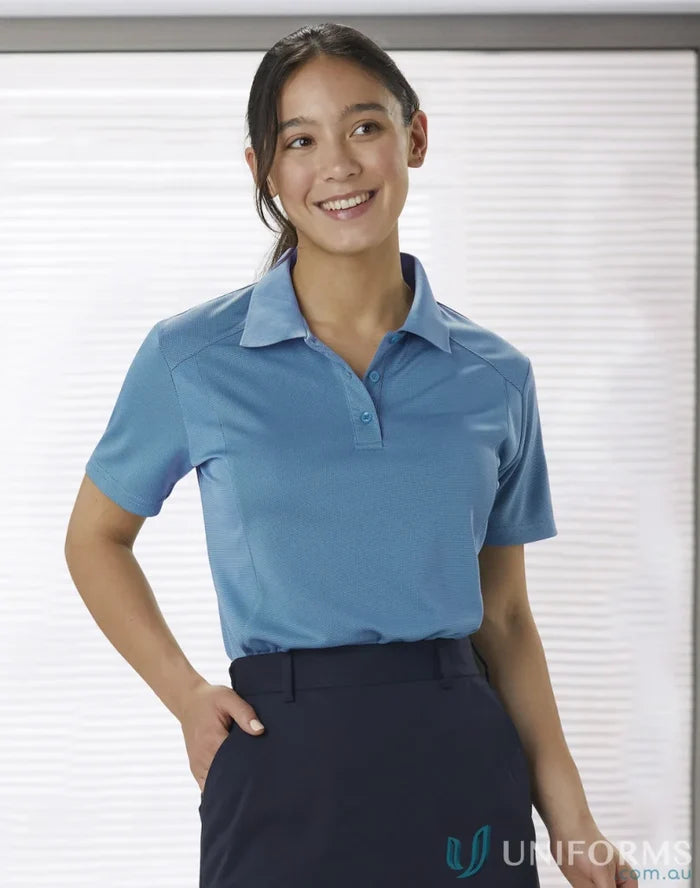 Lady in a ladies breathable bamboo charcoal polo shirt showing eco-friendly fashion style
