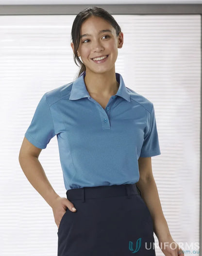 Lady in a ladies breathable bamboo charcoal polo shirt showing eco-friendly fashion style