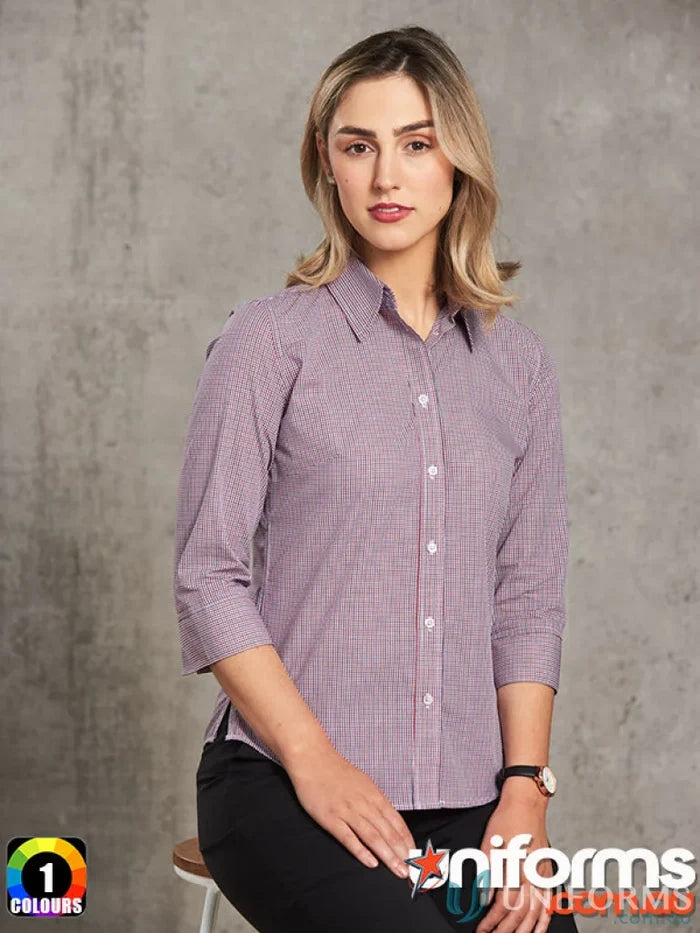 Woman wearing Winning Spirit Ladies mini gingham sleeve shirt in red and white checkered pattern