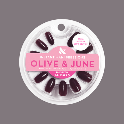 Let’s Stay In - Press-On | Medium | Oval in a deep maroon brown for quick, long-lasting at-home manicures by Olive and June