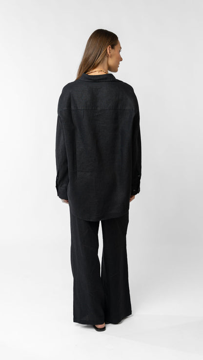 model wearing linen top and pants in black
