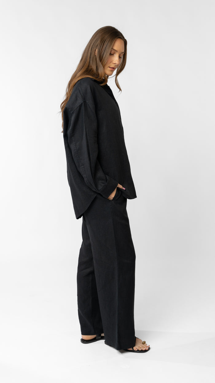 model wearing linen top and pants in black