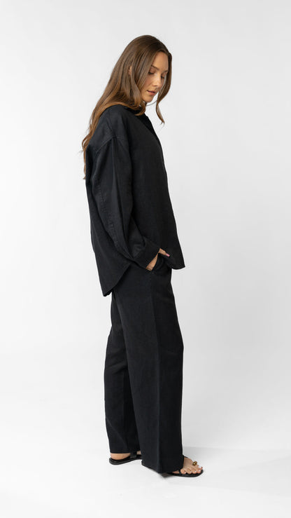 model wearing linen top and pants in black
