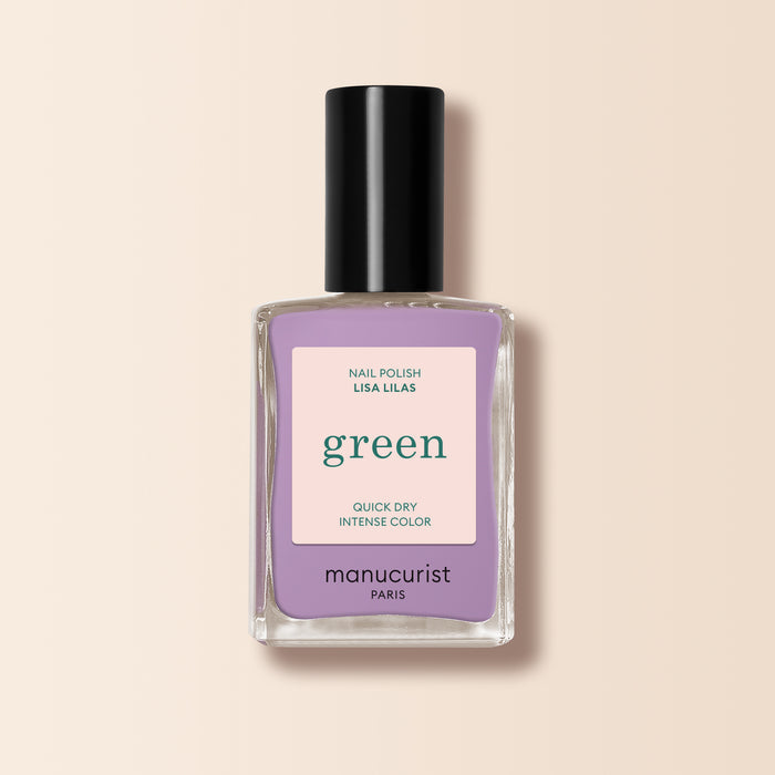 A bottle of Manucurist Lisa Lilas nail polish, featuring a black cap and lavender purple shade, from the Green™ range, set against a light beige background.