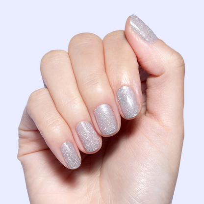 Mani on the Dance Floor Gel applied on natural nails showing sparkling silver glitter gel polish for long-lasting manicure