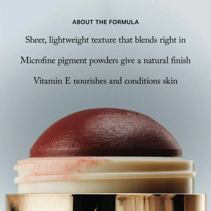 Merit Flush Balm Cream Blush in various shades, close-up of the compact with smooth, buildable blush formula and reflective finish.