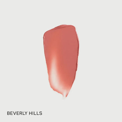 Merit Flush Balm Cream Blush in various shades, natural finish, creamy texture, displayed on a neutral background.