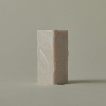 Mini soap bar with embossed leaf pattern, light front and darker back