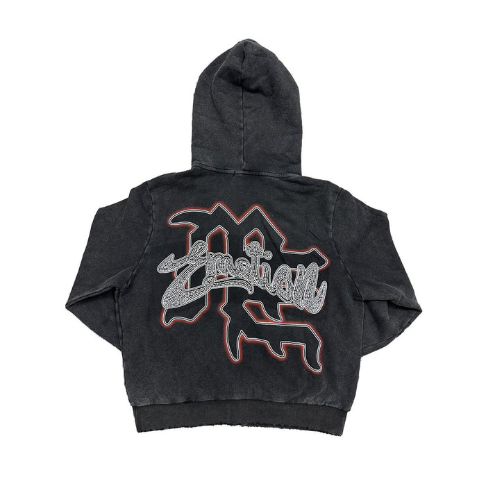 Close-up of the Mixed Emotion Cupid design with rhinestones on the acid wash black hoodie