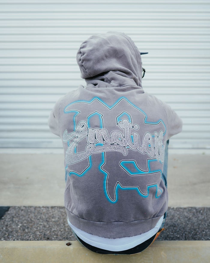 Front view of the Mixed Emotion Cupid hoodie showcasing the rhinestone accents and zip closure